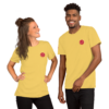 A smiling man and woman in yellow T-shirts with red flower logos.